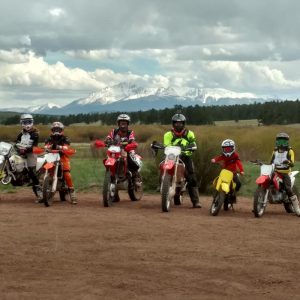 Picture of a Colorado dirtbike guide with several motorcycle riders.