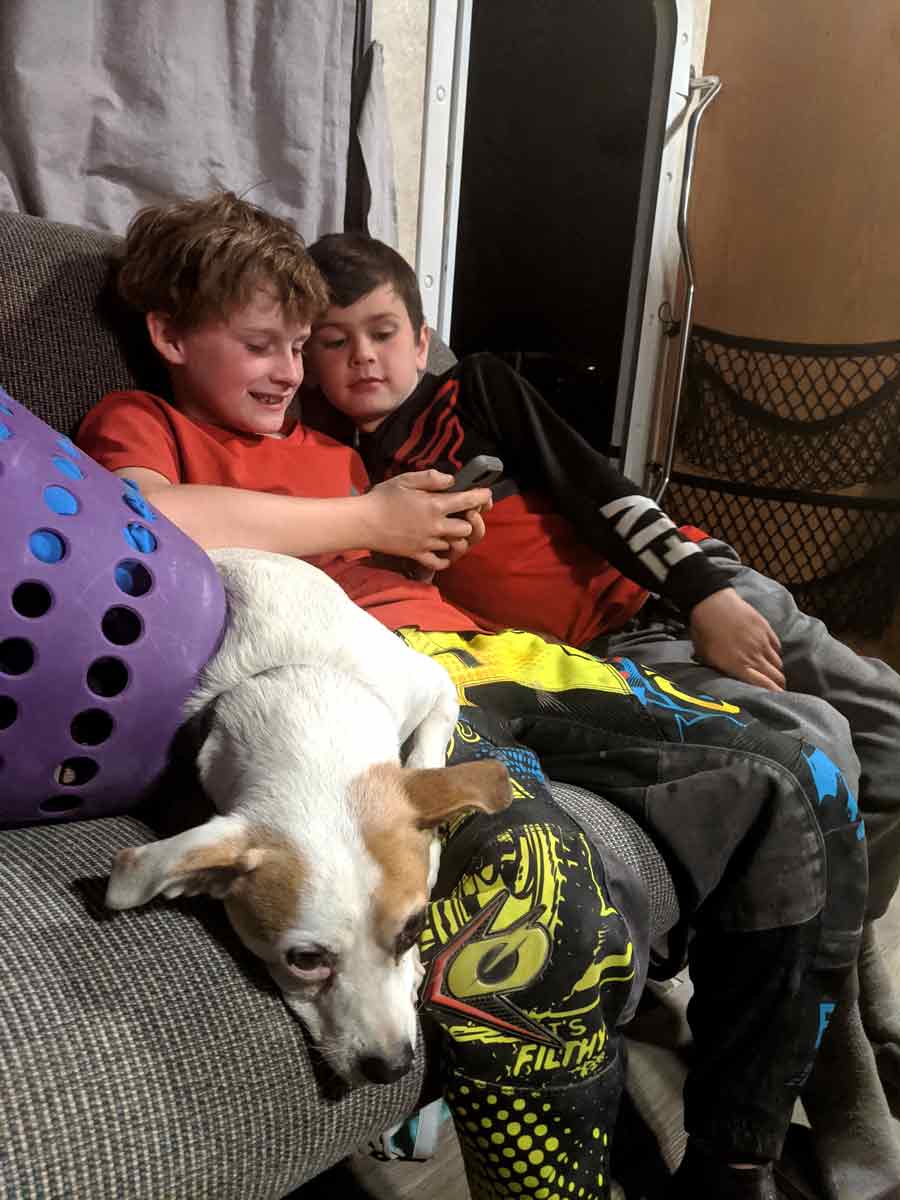 PV_Road-Trip_KidsOnPhone_dirtbike_Gear_RV-Trip