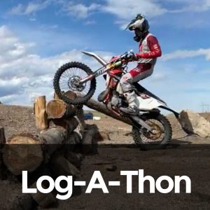 Photo of Rich Larsen on logs at enduro ranch