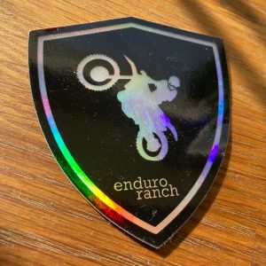 Enduro rider sticker doing a wheelie in the shape of a heart